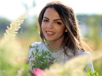girl-portrait-dark-eyes-smile-Featured Image