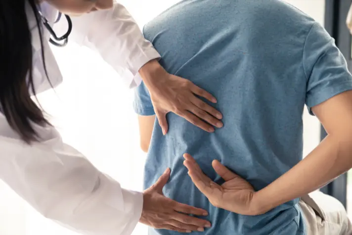 Spinal Adjustments and Soft Tissue Therapies for Pain Relief