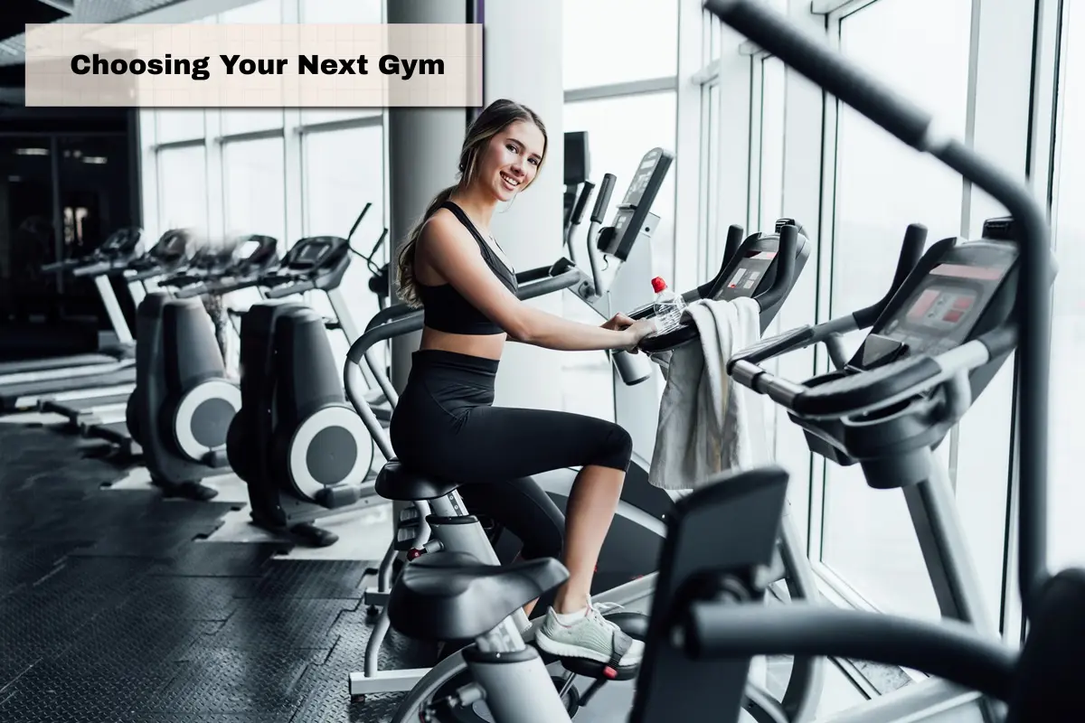 Wide-angle view of a modern commercial gym facility in the United States, showcasing a clean layout, organized equipment, and an inviting atmosphere for fitness enthusiasts.